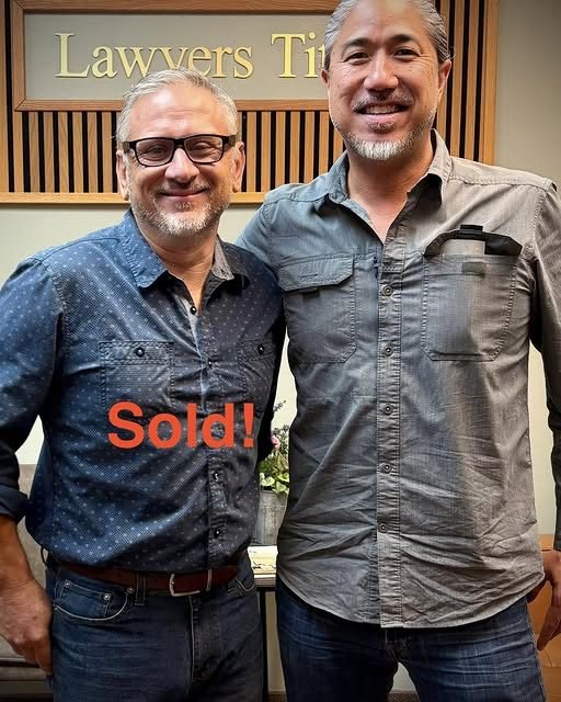 Lorne McMillan with client Yuki on closing day